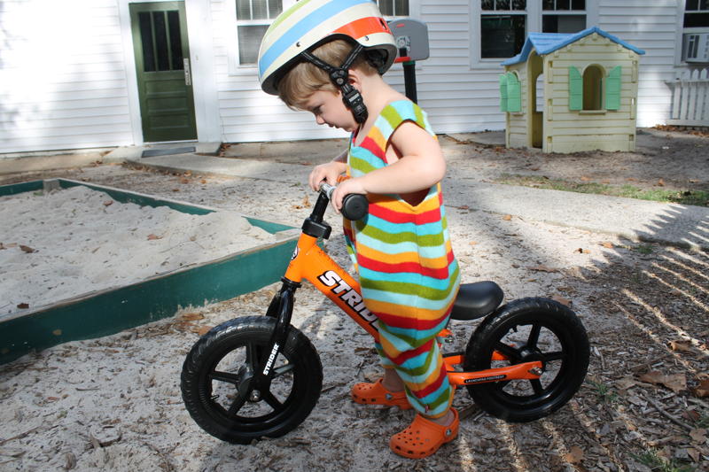 Boy age 2 on Strider Prebike